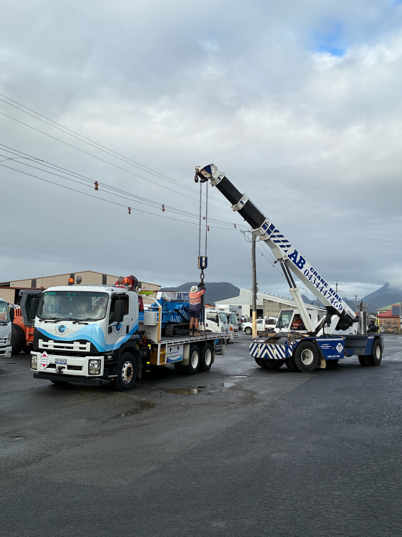 Mobile crane and Foley Logistics vehicles completing council relocation lifting