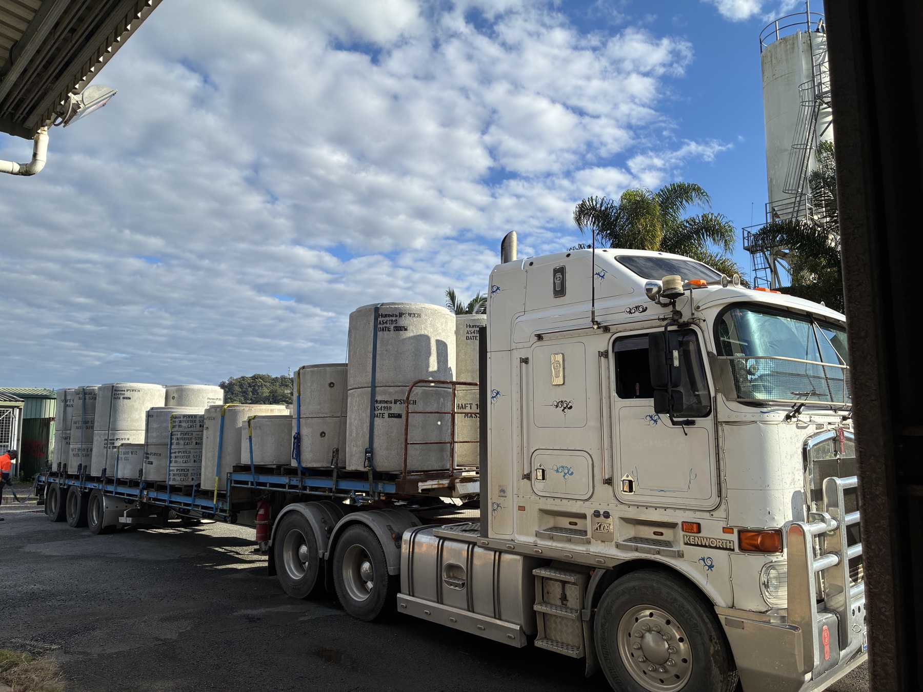 Prime mover transporting heavy council equipment during the Tweed Shire relocation